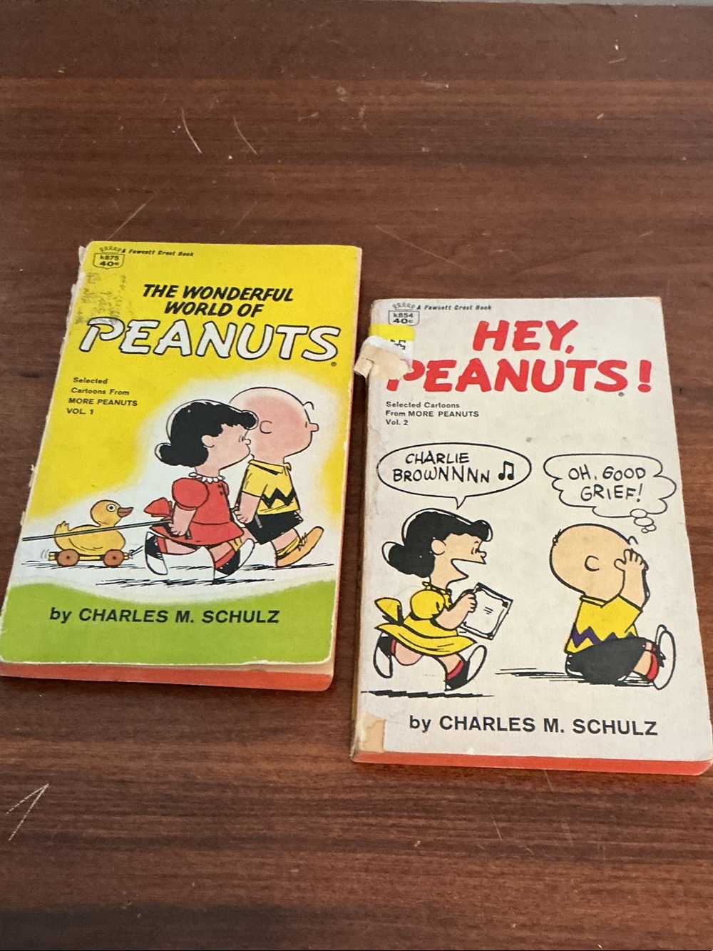 Peanuts Yellow and White Comic Book Pair by Peanuts